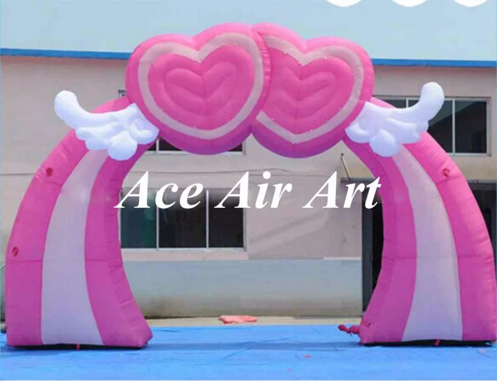 

custom pink inflatable event arch with flying heart for wedding decoration