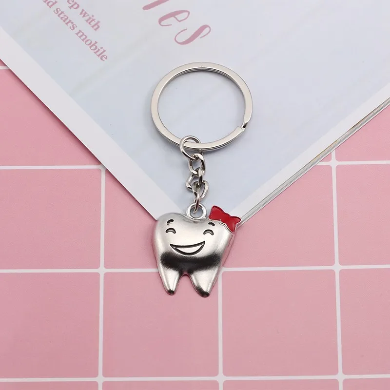 2-Pcs-Cartoon-Couple-Keychain-Cute-Bowknot-Teeth-Tooth-Key-Chain-Dentist-Decoration-Jewelry-For-Doctor (3)