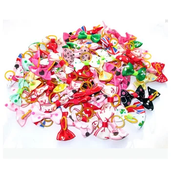 

100pcs Dog Grooming Bows Pet bowknot Hair Bows Rubber Bands Pet headdress flower Hair Card Beauty Ornaments Dog Hair Accessories