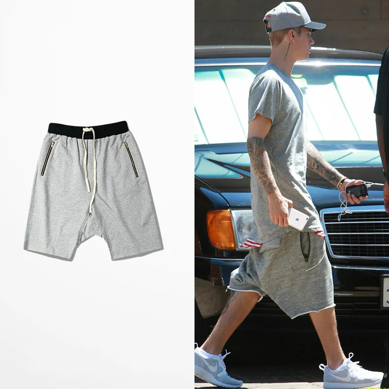 

Men Shorts Unedged Cuff Raw Cutting Hip Hop High Street Shorts Skateboard Dropped Crotch Knee-length Shorts Zipper Pockets