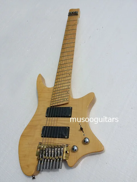 

Musoo brand 8 strings fanned fret headless electric guitar with tremolo