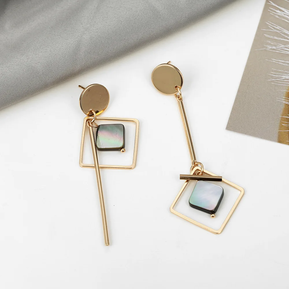 

South Korea's new temperament long pendant ear jewelry female personality all-in-one geometric asymmetrical shell earrings