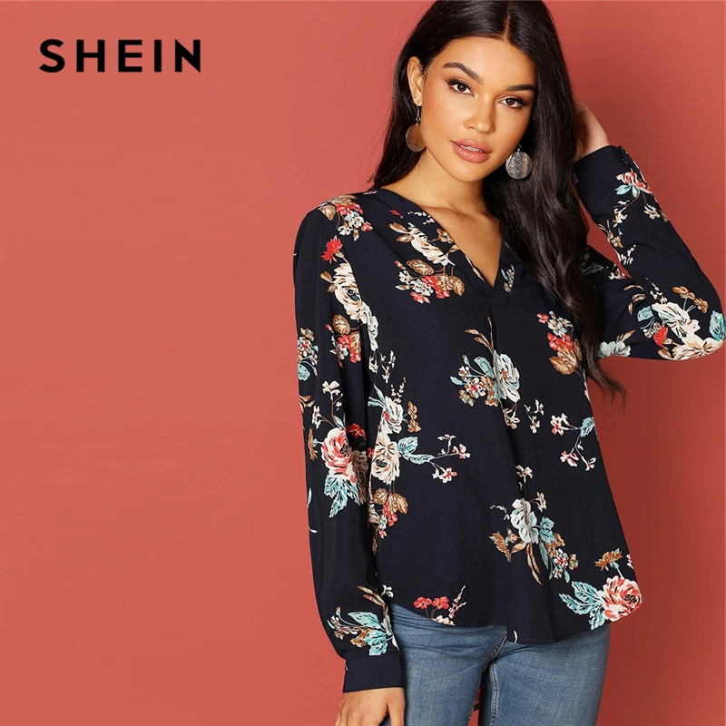 

SHEIN Navy Vacation Holiday Floral Print V-Placket Curved Dip Hem Asymmetrical Blouse Autumn Casual Women Tops And Blouses