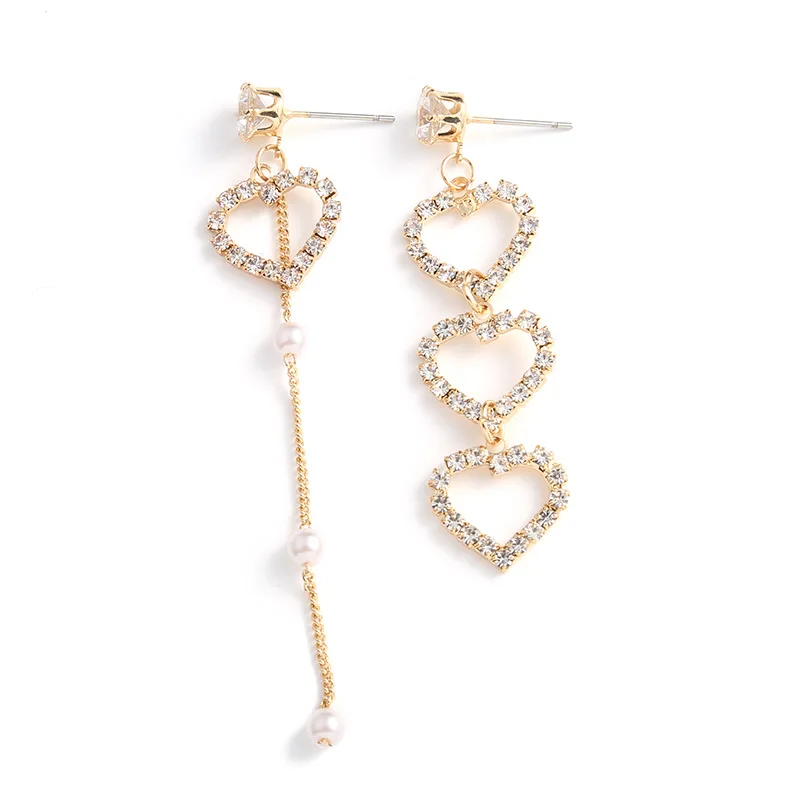 

Punk Fashion New Earrings Temperament Personality Heart-shaped Crystal Asymmetric Bride Pearl Ladies Earrings Wholesale Sales