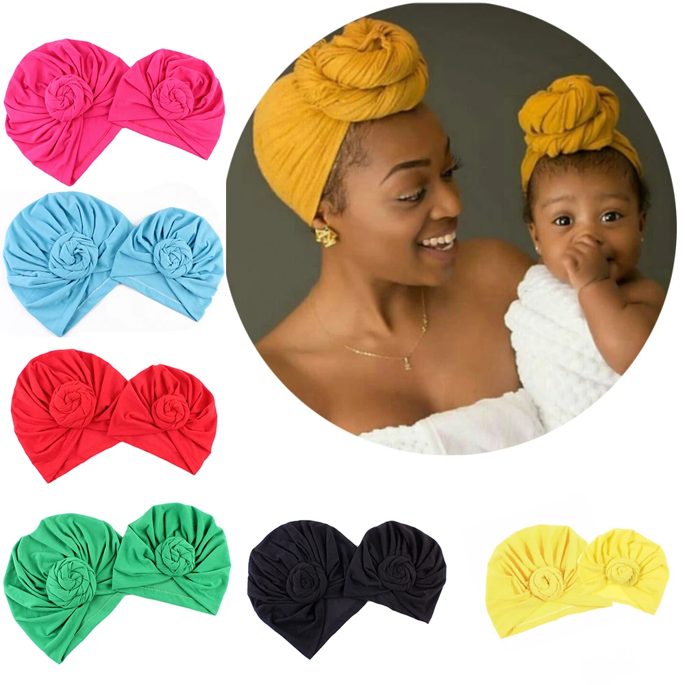 

Mom And Baby Solid Colored Donut Hats BeBe Turban Hood Solid Knotted Cap Cotton Cute snails Hats Newborn baby Indian knot turban