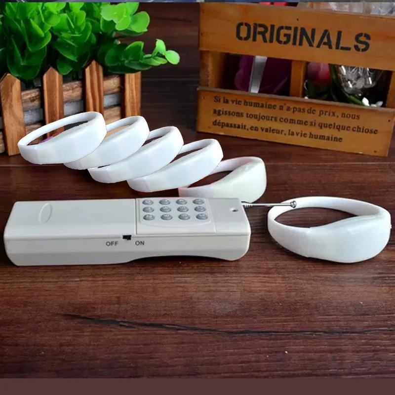 

LED RGB Color Change Silicone White Case Bracelets with 12 keys remote control for Party Event free shipping 70pcs/Lot