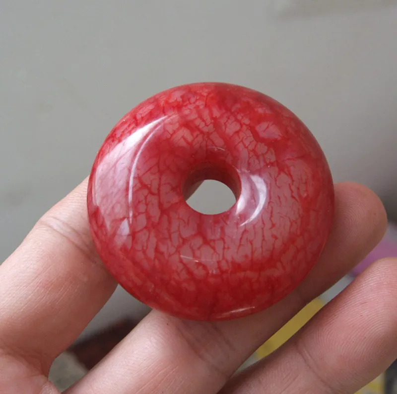 

100% authentic, natural Xiuyu, chicken blood jade safety buckle.