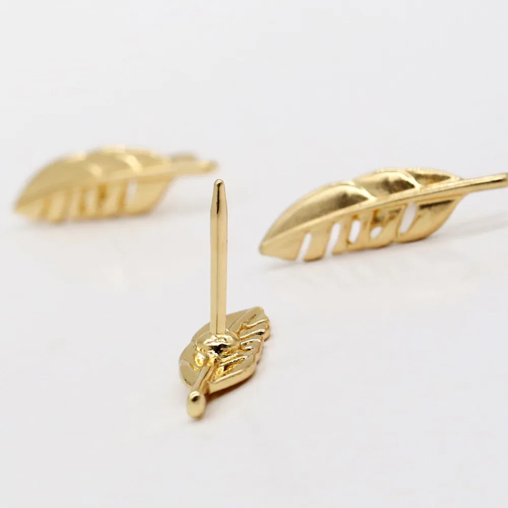 light blue push pins gold feather