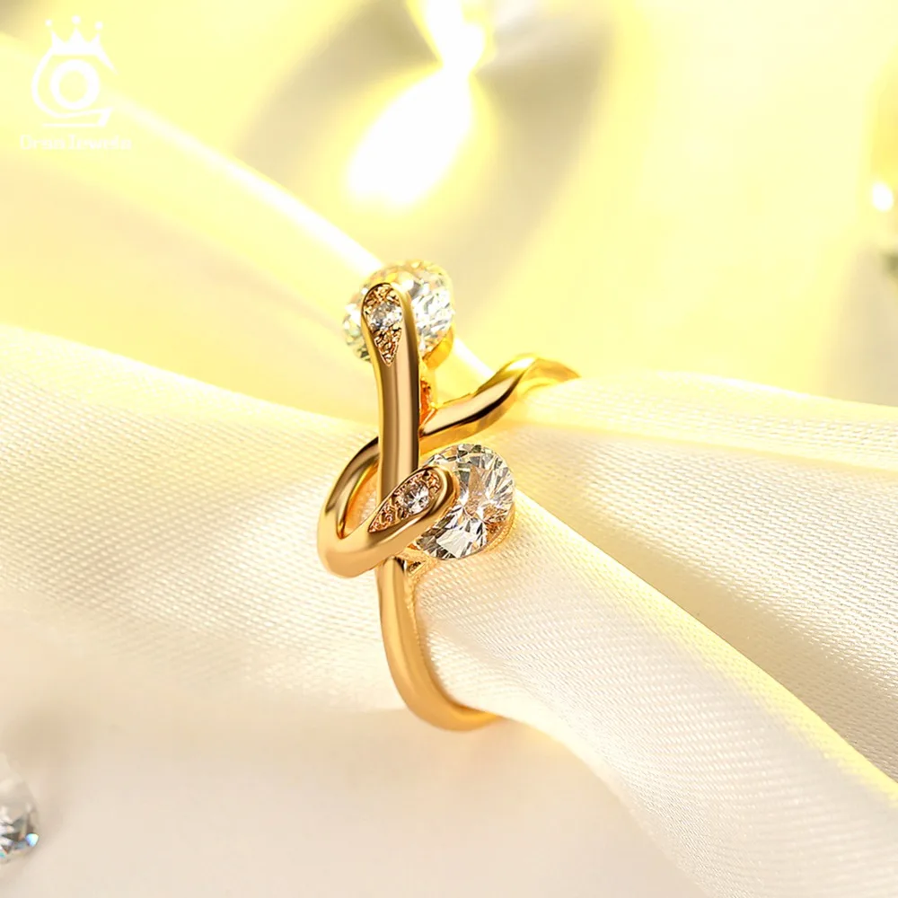 ORSA JEWELS Rings For Women AAA Cubic Zircon Gold-Color Twisted Ring Luxury Female Jewelry Wedding Gift New Arrivals OMR18