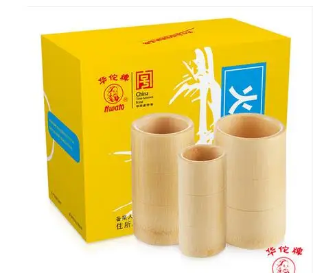 Бамбуковый баночный аппарат, большие натуральные баночки из бамбука в небольших бытовых типах. Три традиционные cupping-jfie56 всасывания