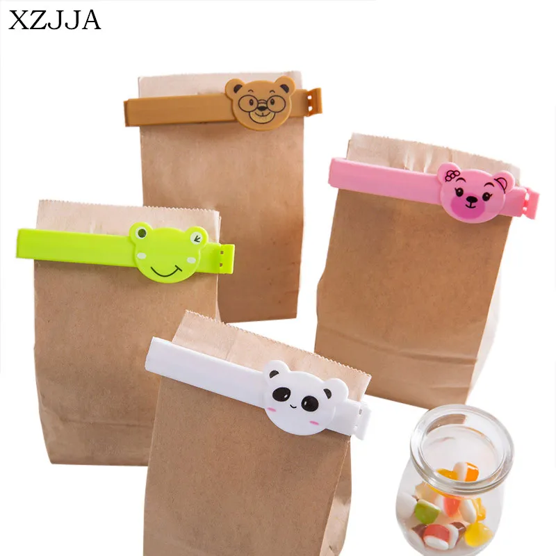

XZJJA 4Pcs/set Cartoon Animal Plastic Bag Clips Snack Food Bag Sealer Kitchen Gadgets Sealing Machine Portable Clip Alimentaire