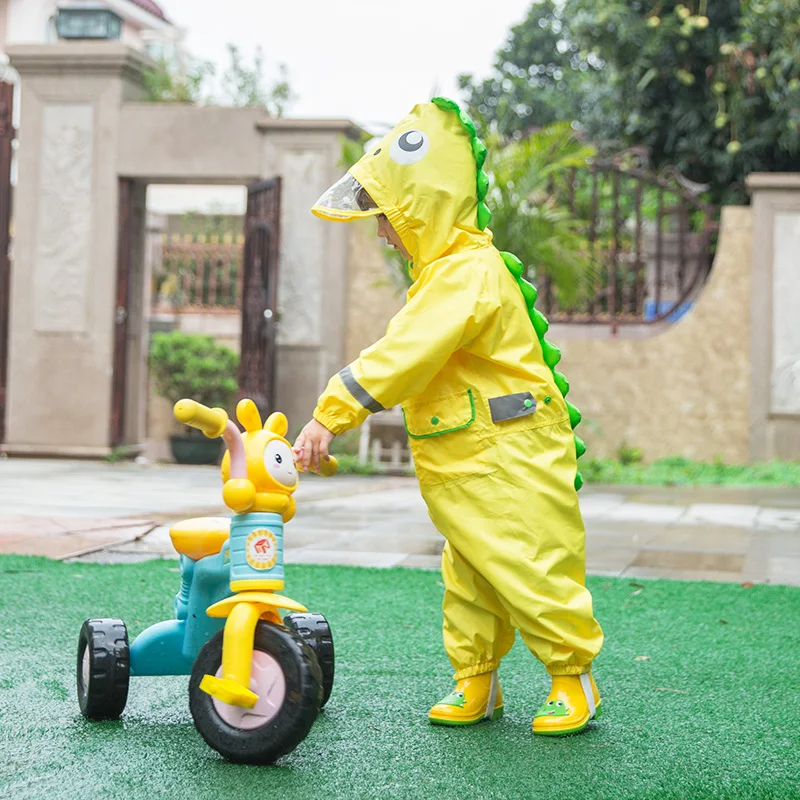 

2-9 Years Children Fashionable Waterproof Jumpsuit Raincoat Hooded Cartoon Dinosaur Kids One-Piece Rain Coat Baby Tour Rain Gear