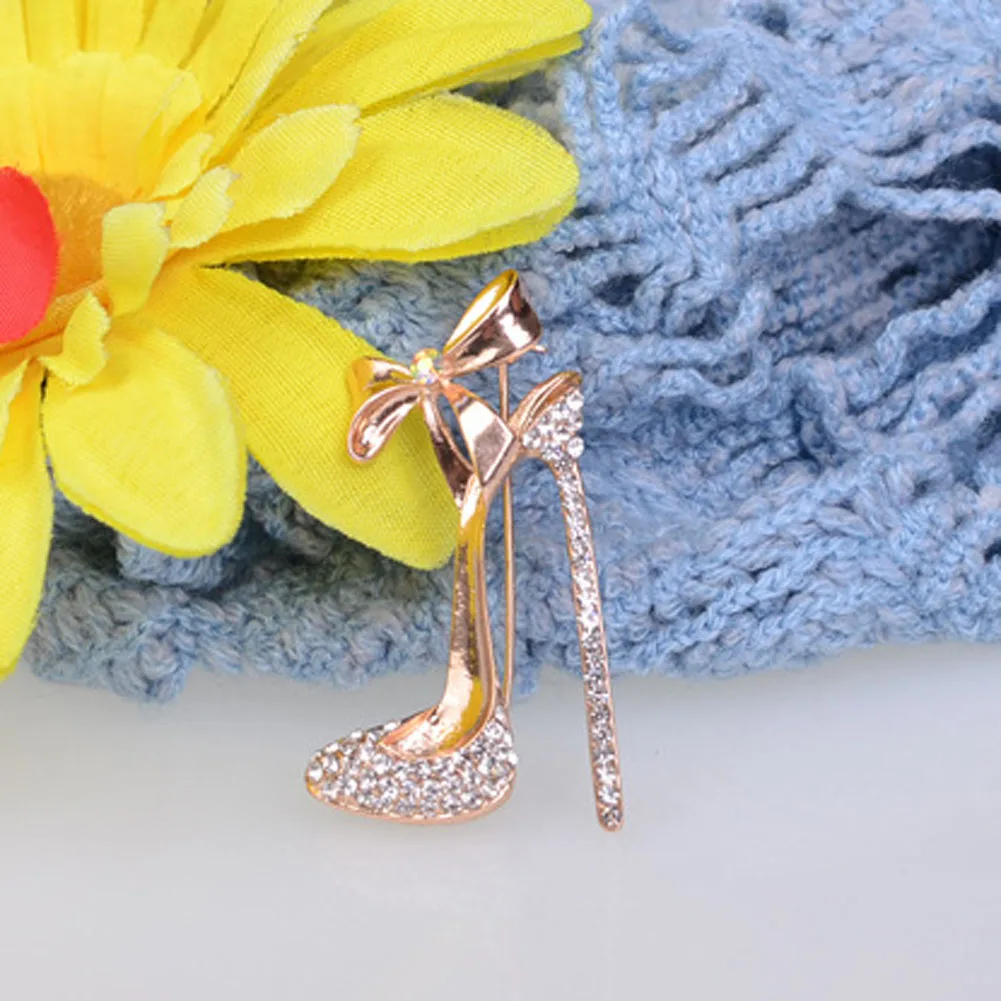 black heels with brooch