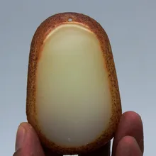 Китай Синьцзян натуральный Специальный сорт Хотан нефритовый материал семян гуаньин кулон