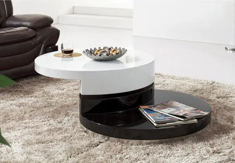 Simple small family. Round tea table. Table of black and white of the lacquer that bake sale