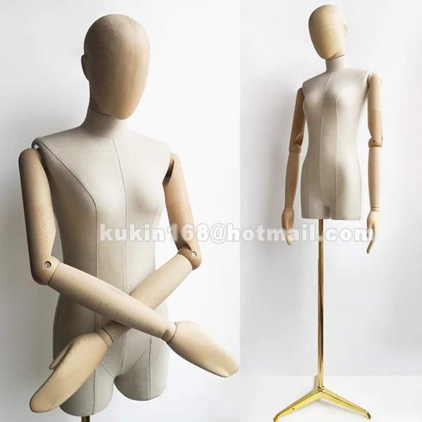 

Female display mannequin with wooden arms and heads
