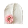 white hat pink flowe