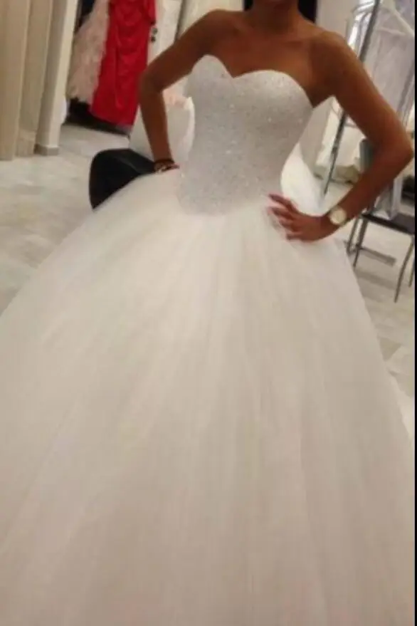 beaded bodice ball gown wedding dress