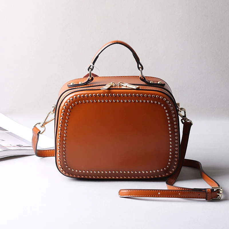 

2017 The new 100% Genuine Leather bag shoulder bag with single shoulder bag retro simple styling rivet carrying square bag