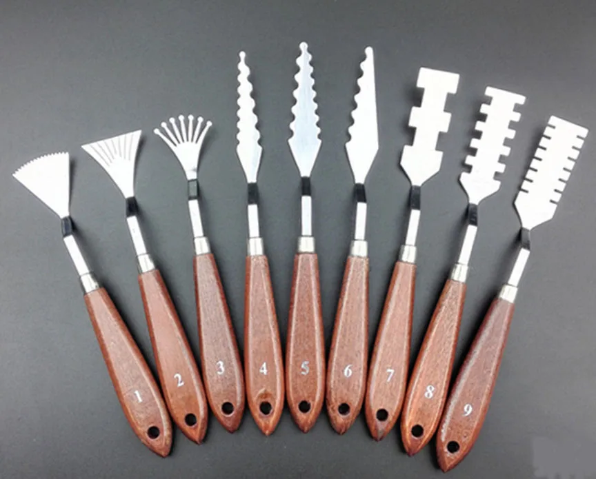 шпатель для рисования маслом. инвентарь для пчеловодства. металлический шпатель с круглой ручкой. маленький шпатель для рисования. шпатель для рисования.