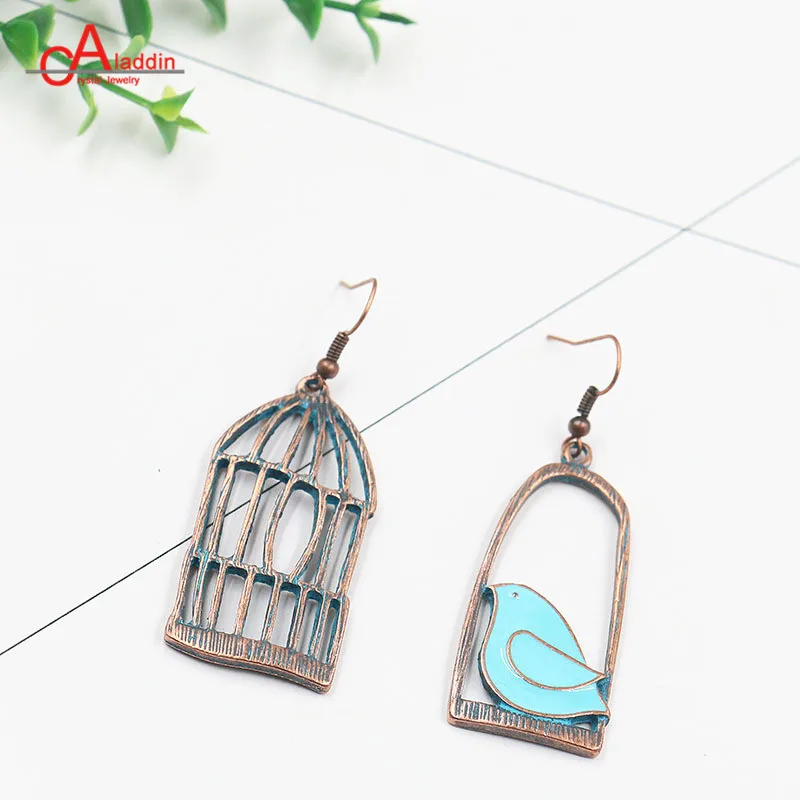 

Aladdin Europe and the United States popular asymmetric alloy earrings women creative bird cage long pendant ear jewelry