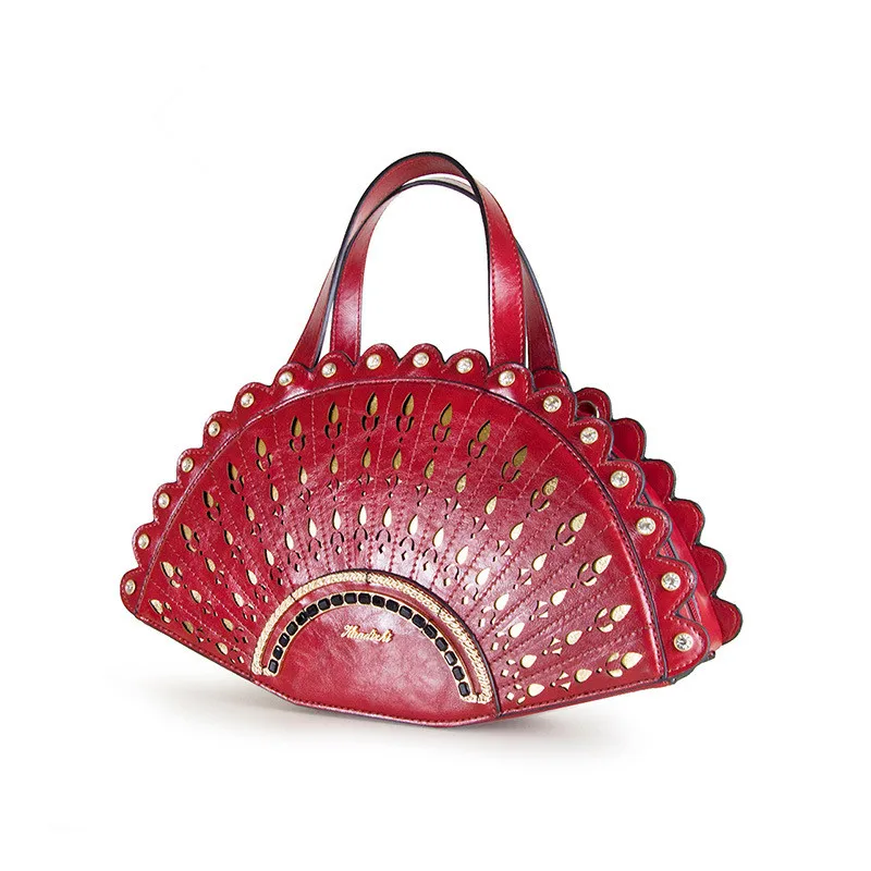 Europe and America hollow out gold pattern fan shaped handbag unique