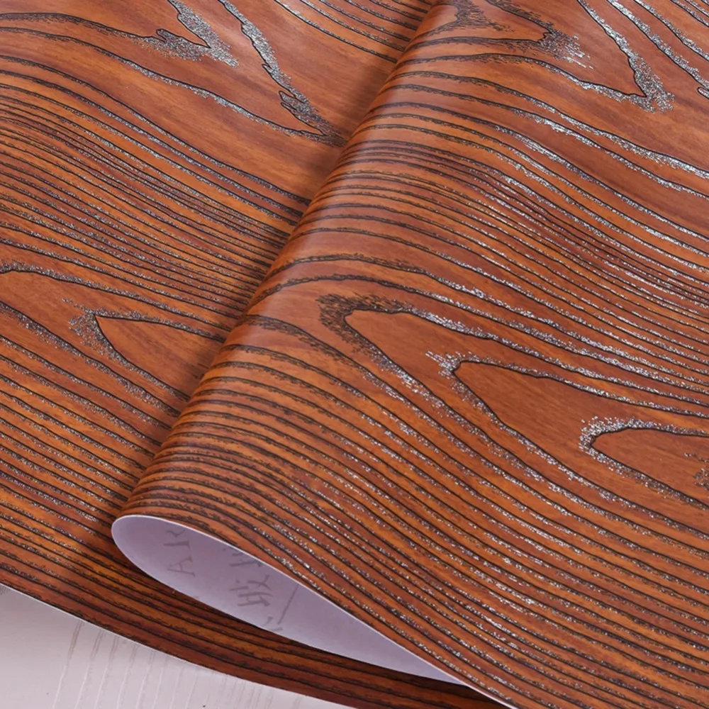 Automotive wood grain adhesive strip