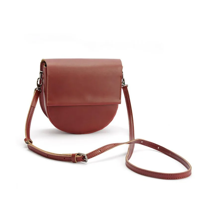 

The famous brand new lady small square bag retro cowhide bag single shoulder slanted bag independent design