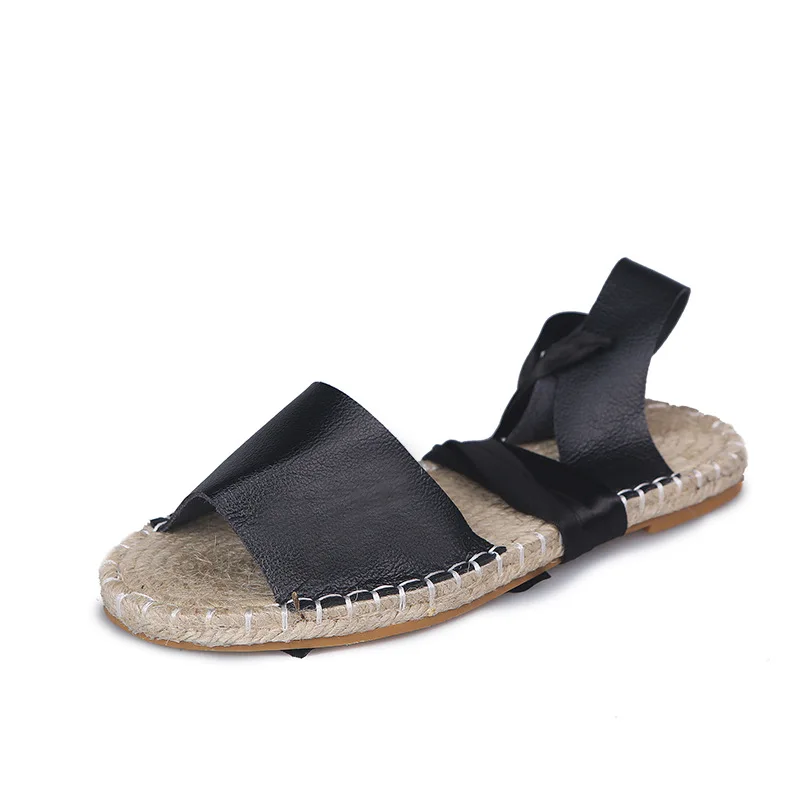 

Fashion flat straw cross belt women's sandals 2019 summer new style.
