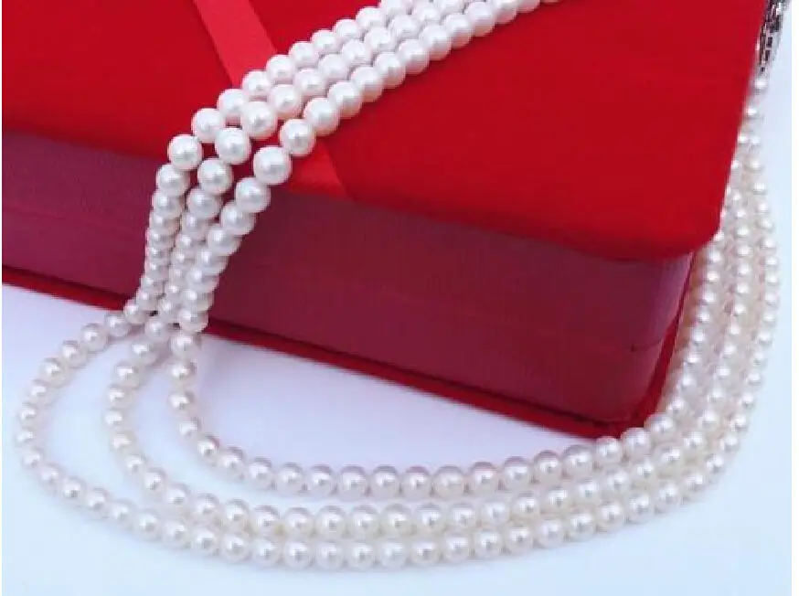 

Beautiful new AAA 7-8mm natural white south sea pearl necklace 54" Yellow clasp