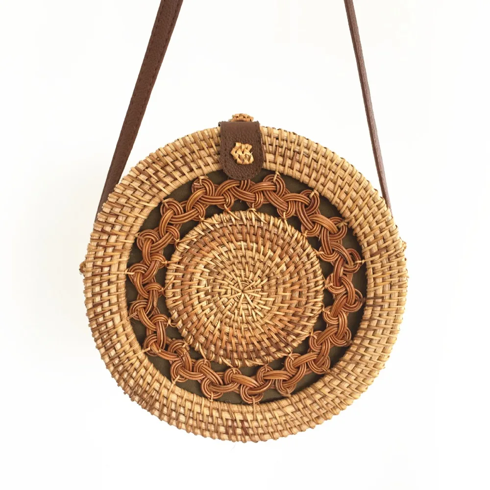 

Hand-woven woven diagonal women's shoulder bag leather buckle straw round beach bag Bohemian style Ins with Bali hot list