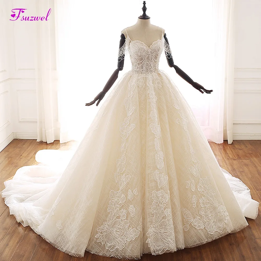

Fsuzwel Romantic Sweetheart Neck Beaded A-Line Wedding Dress 2020 Gorgeous Lace Appliques Princess Bridal Gown Vestido de Noiva