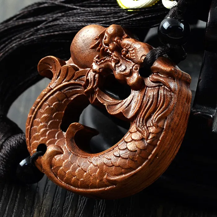 

Rosewood carved ornaments dragon car pendant ornaments wholesale home hanging jewelry 0191