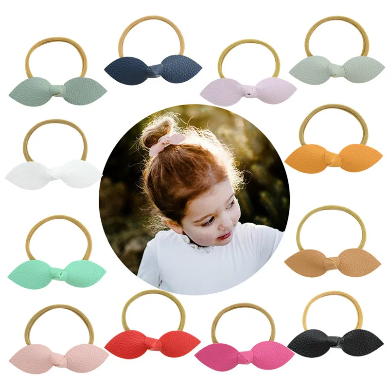 

Approx 4" Kids Cute Artificial Leather Bow Tie Elastic Hair Band Baby Girls Ponytail Holder Hairband Rope Women Hair Accessories