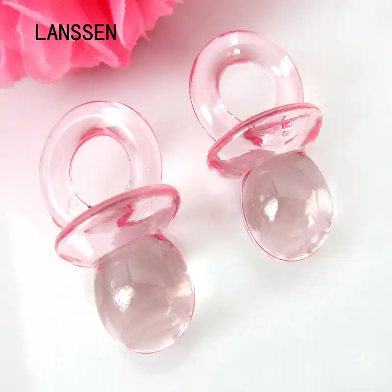 pink plastic pacifiers for baby shower