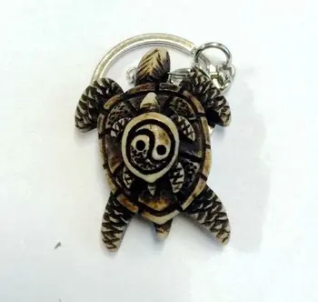 

Alert ! 12 Pcs Imitation yak bone carving turtles surfer keychain Tai Chi
