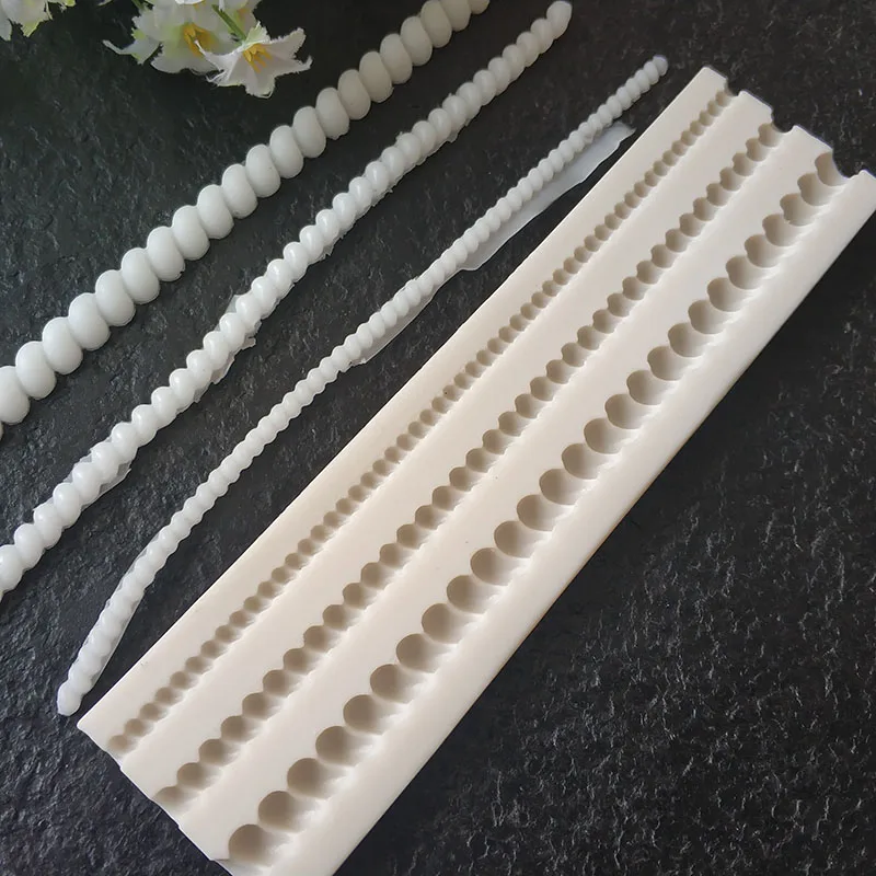 

KLM-00153 Pearl cake decoration silicone mold Rope bar shape chocolate cake surround tool