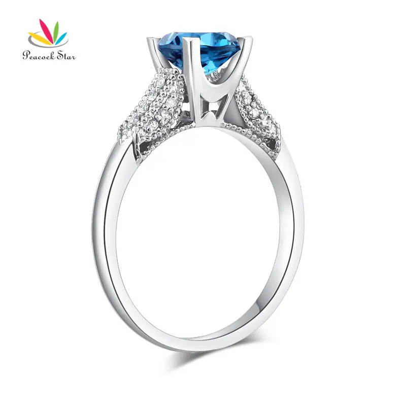 

Peacock Star 14K White Gold Wedding Engagement Ring 1.2 Ct London Blue Topaz & Natural Diamonds