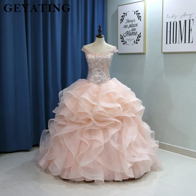 

Sweet 16 Dresses 2019 Elegant Off Shoulder Coral Pink Quinceanera Dress Plus Size Ball Gown Beaded Crystal Ruffles Vestido de 15
