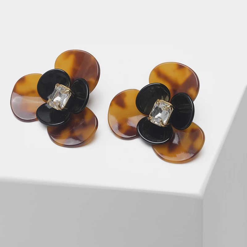 

Floral design with stylish exaggerated drop earrings
