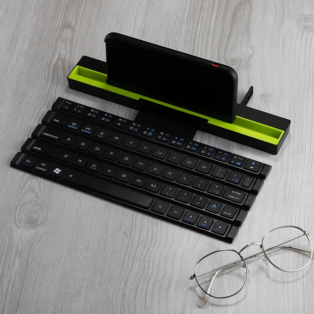 R4 64 Keys Reel Portable Mini Folding Bluetooth Keyboard Foldable Wireless Keypad for Tablet