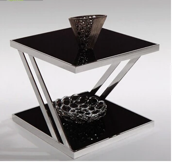 Toughened glass tea table.. Stainless steel small square table. The sofa side table. Flower Toughened glass tea table.. Stainless steel small square table. The sofa side table. Flower