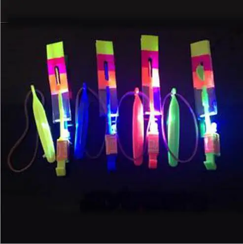 

800PCS DHL Shining Rocket Blue Light Copter Arrow Helicopter Neon Led Light Amazing Elastic Powered LED Arrow Helicopter Flying