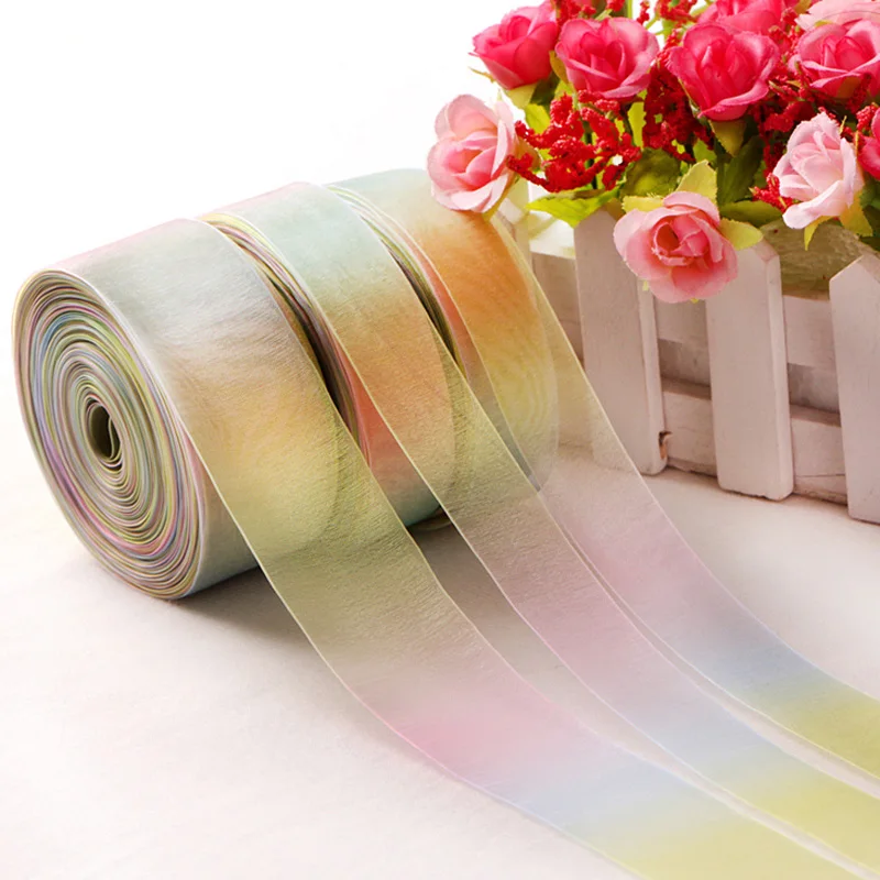 

50yards/lot ( 45meters ) 15mm 25mm 38mm 50mm 75mm Width 100% Polyester Light Rainbow Organza Ribbons
