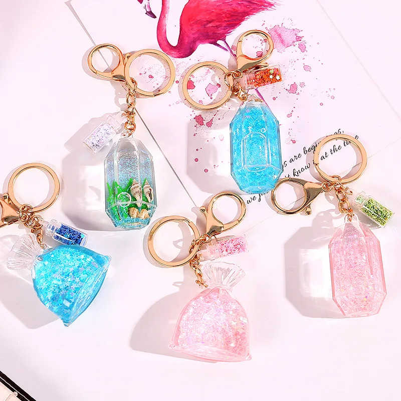 

2019 New Cute Girls Lovely Flowing Quicksand Glitter Powder key chains Crystals Pendant Couple keychains keys Hanging holder