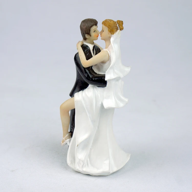 

Funny Decorative The Bride with Her Legs Around the Groom Romantic Cake Topper