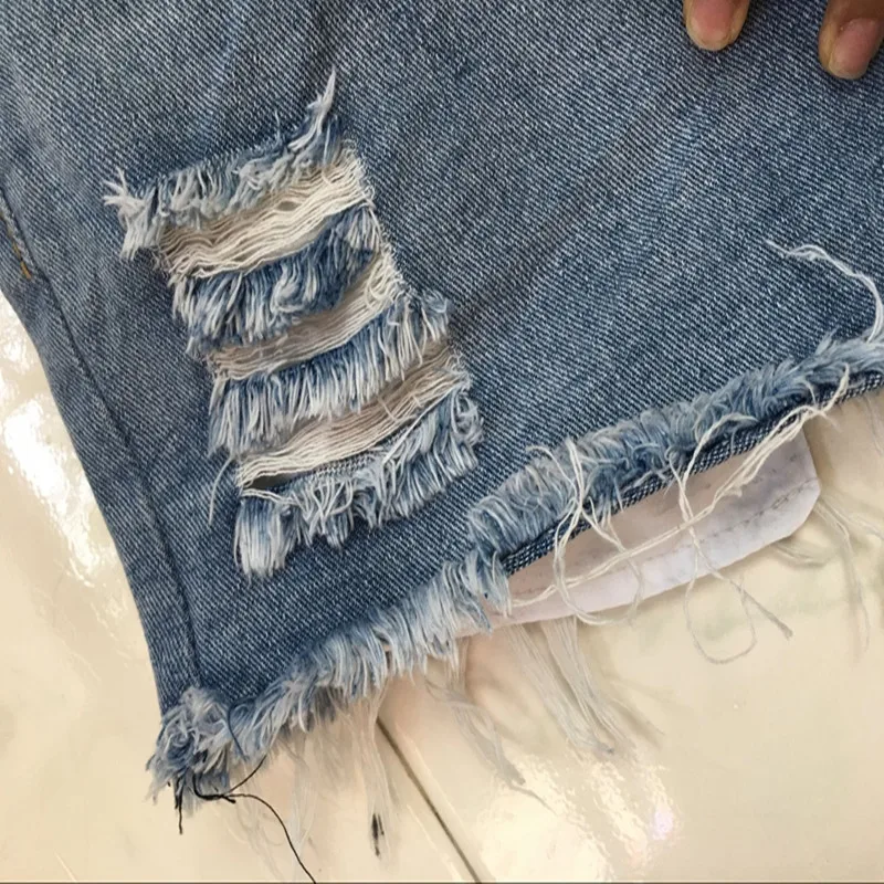 Sexy Hole hotpants Summer high waist Distressed Denim Hot Shorts Women Ripped short pants ladies Vintage Mini booty shorts jeans Sexy Hole hotpants Summer high waist Distressed Denim Hot Shorts Women Ripped short pants ladies Vintage Mini booty shorts jeans