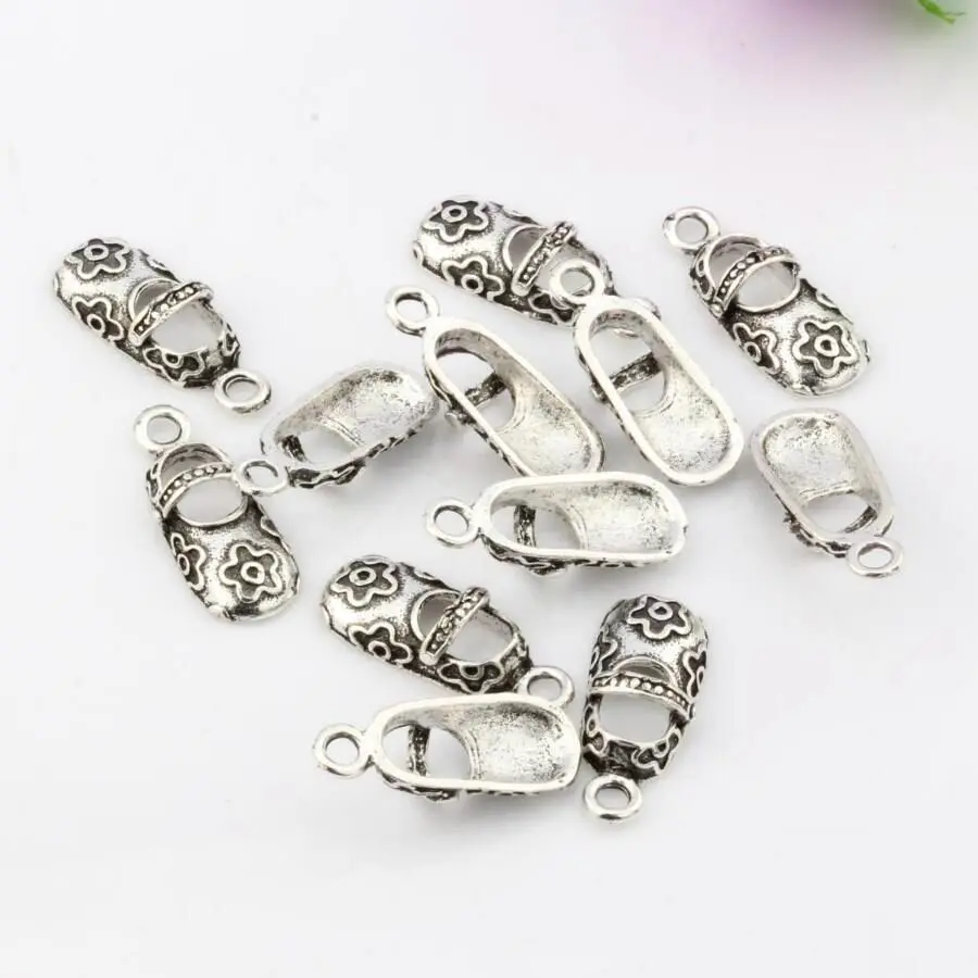 

Wholesale 10pcs Tibetan Silver Children floret Shaped Shoes Beads Charm Pendant Findings 8.5*21.5mm A265