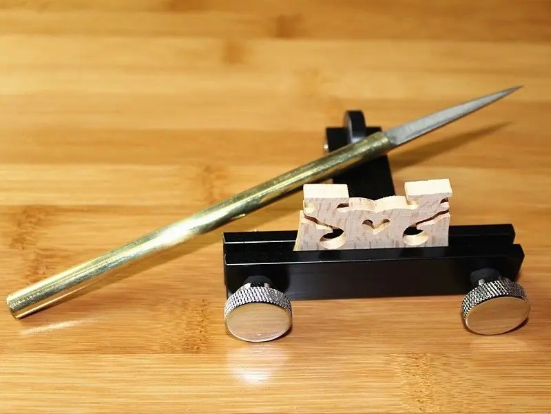 

Violin repair/install tool:New Redressal violin Bridge (Machine and cutter )