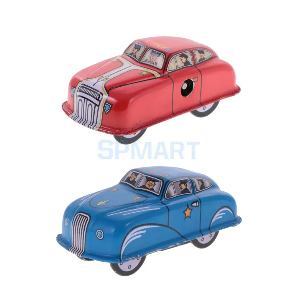 игрушка заводная. игрушечные заводные машинки. две игрушки заводные машины. заводная машинка. машинка заводная на веревочке.